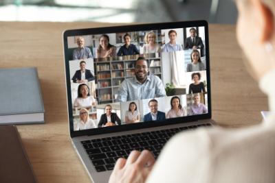 video call on a laptop with multiple participants 